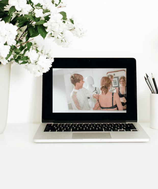 Sarah Connelly Virtual Bra Fitting, Macbook on white desk next to flowers