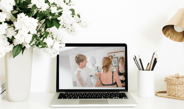 Sarah Connelly Lingerie Fitting and Styling_ Virtual bra fitting demonstration, laptop on desk with flowers