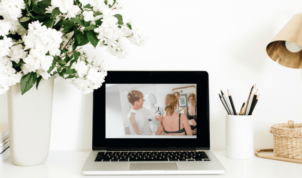 Sarah Connelly Lingerie Fitting and Styling_ Virtual bra fitting demonstration, laptop on desk with flowers