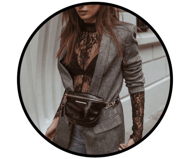 Woman wearing black lace long-sleeve body and grey tweed blazer