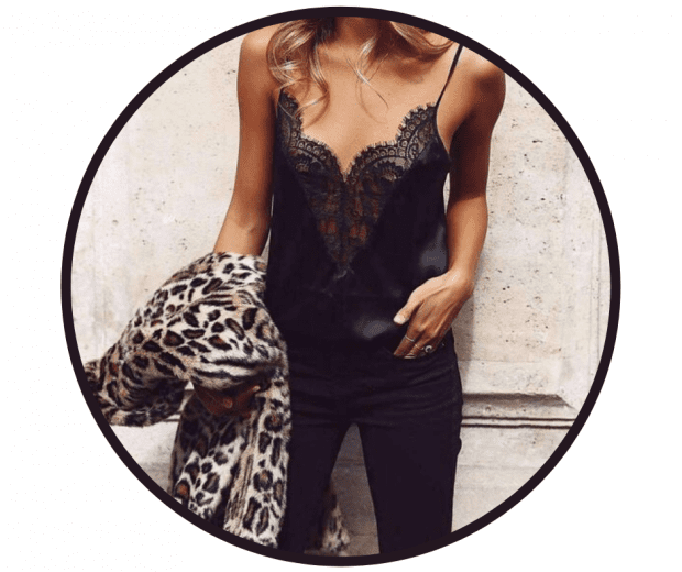 Wear a black silk camisole with denim or biker leather