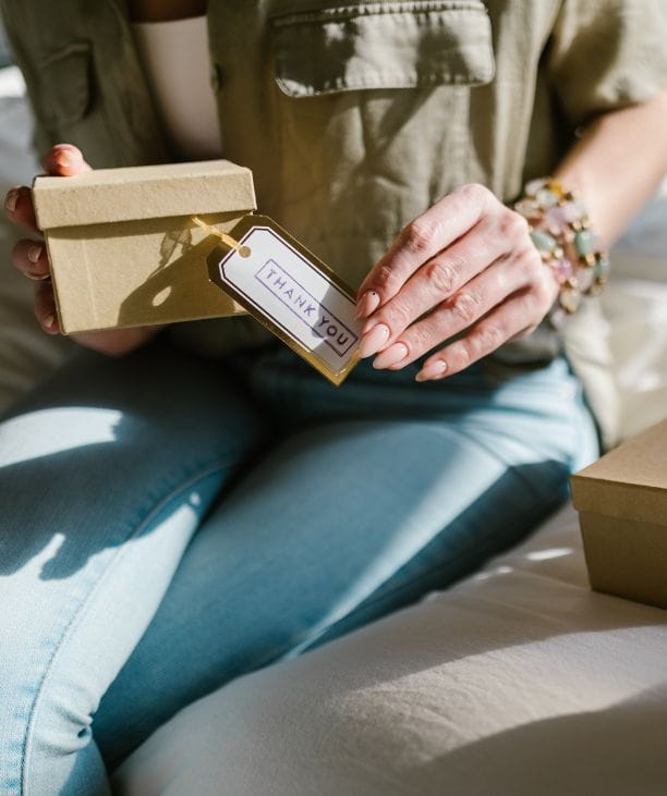 How to Build Customer Loyalty in a Small Business (personalised gift flat lay)- Sarah Connelly - Strategic partner for founder-led fashion & lifestyle brands | Fractional COO, Mentor & Wing-woman
