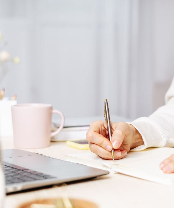 small business mentor reviewing existing customer list to attract right customers