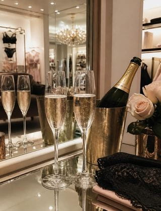 luxury lingerie boutique fitting room with champagne - personal lingerie shopper London